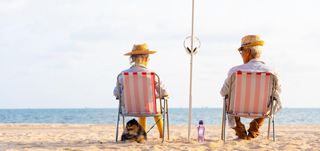 Couple sitting on the beach