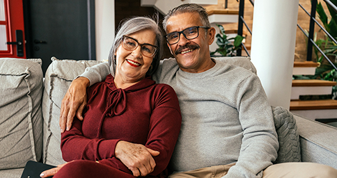 Man and woman happy to have gotten Medicare coverage