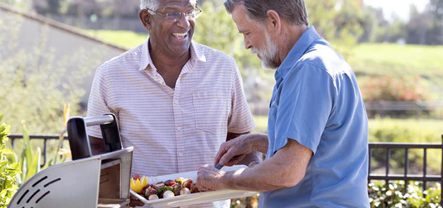 Men barbecuing